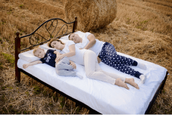 People lying on orthopedic pillows